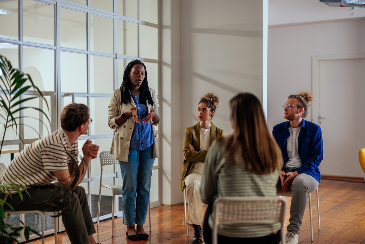 Afro American Explaining Support Group Her Issues AdobeStock 506953436 Large